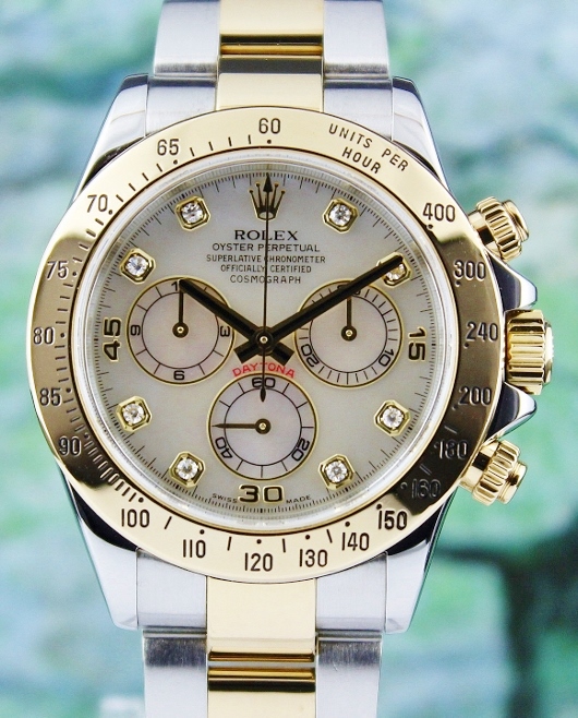 A ROLEX OYSTER 18K YELLOW GOLD AND STAINLESS STEEL DAYTONA COSMOGRAPH - 116523